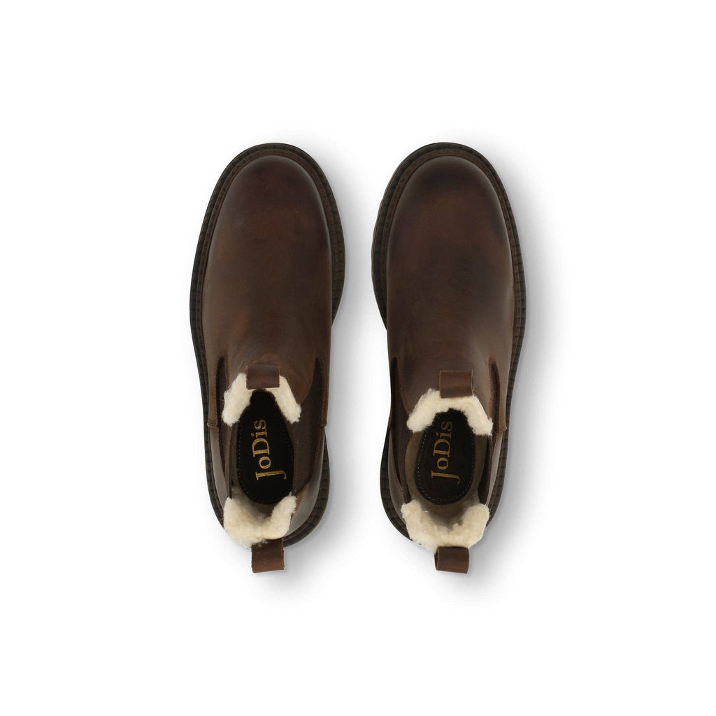 Dunkelbraune MODENA Chelsea Boots von oben mit Blick auf das helle Warmfutter und die Anziehschlaufen